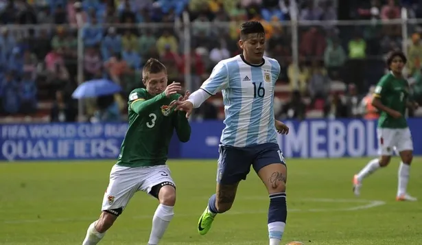 Alejandro Chumacero y Marcos Rojo