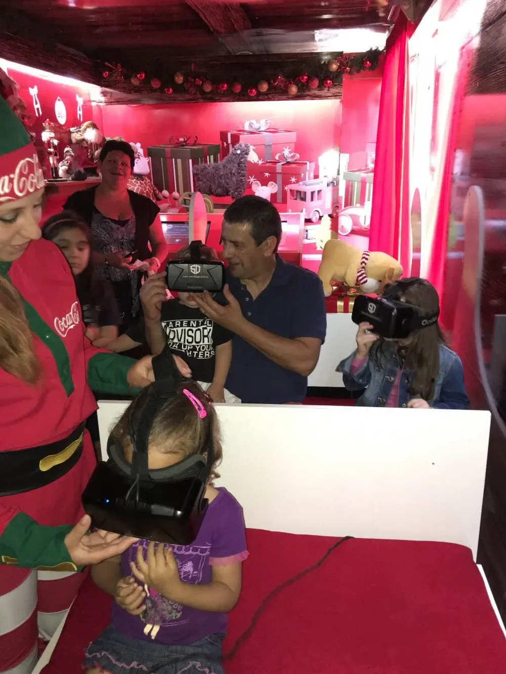 Acción de Coca-Cola en la Casa de Papa Noel