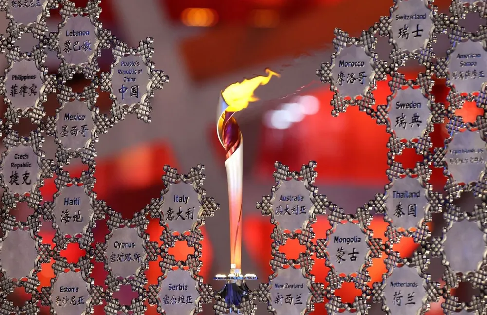 El coronel Qi Fabao participó del relevo de la antorcha en la inauguración de los Juegos Olímpicos