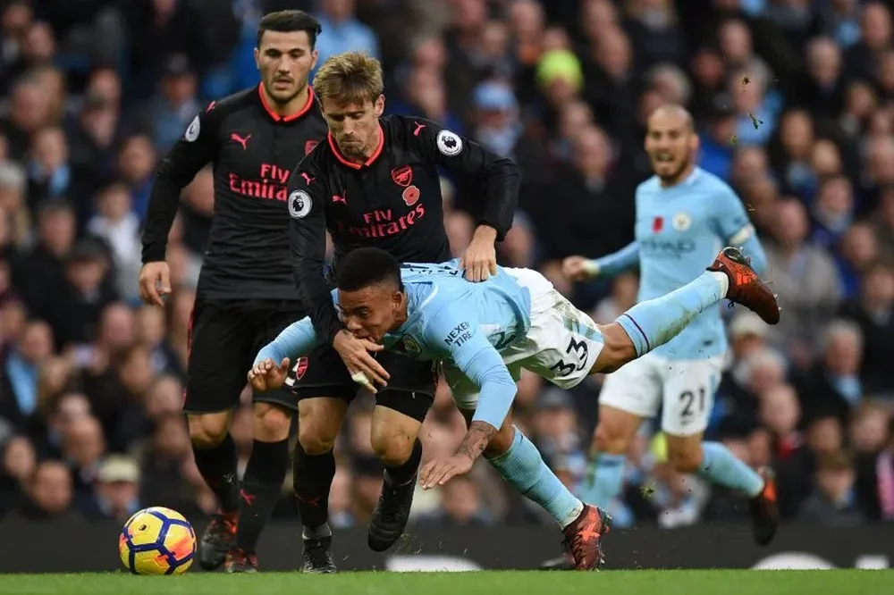 Nacho Monreal y Gabriel Jesús