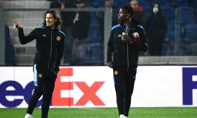 Edinson Cavani y Paul Pogba en la previa