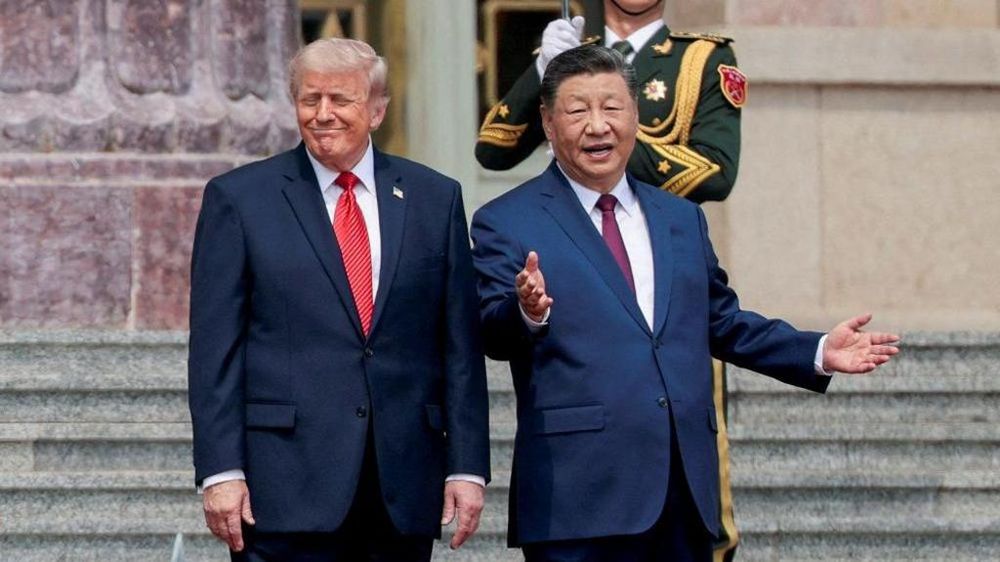 Los presidentes Xi Jinping y Donald Trump durante su primer encuentro en Pekin.