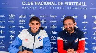 La firma junto a Martín Ligüera