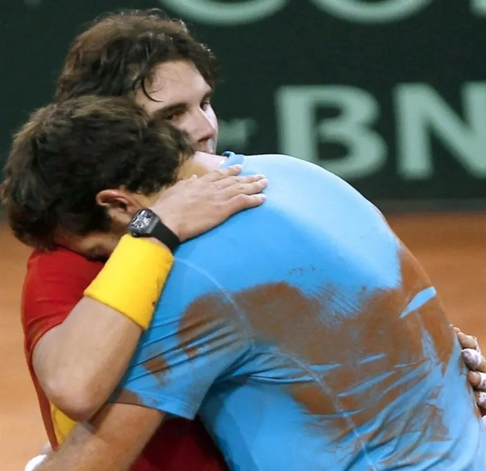 Rafael Nadal y Del Potro al final del partido.