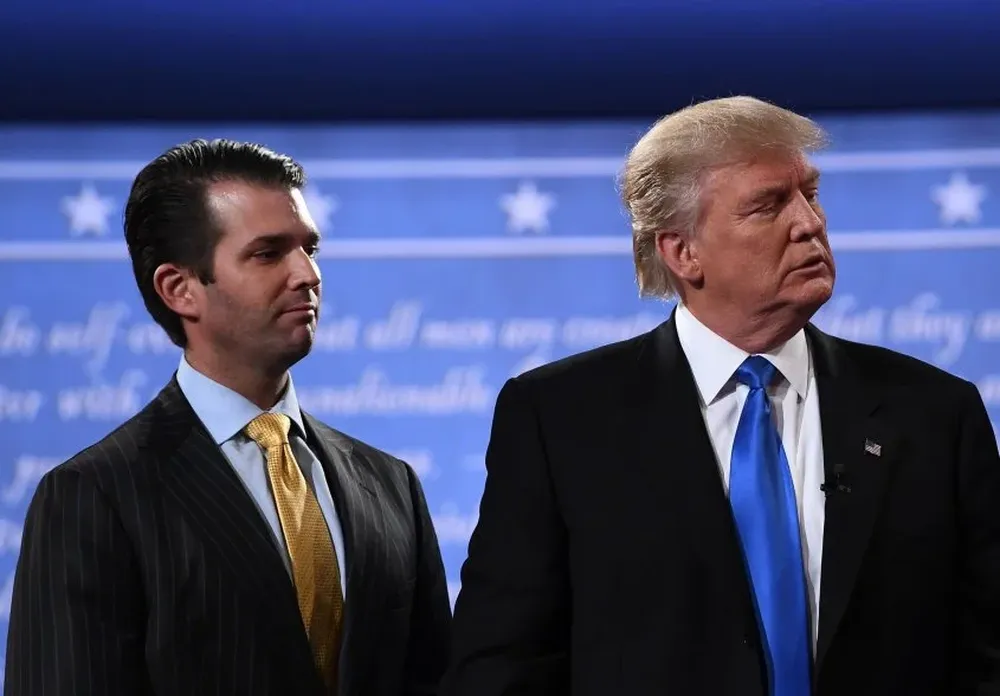 Donald Trump hijo y padre, en septiembre de 2016