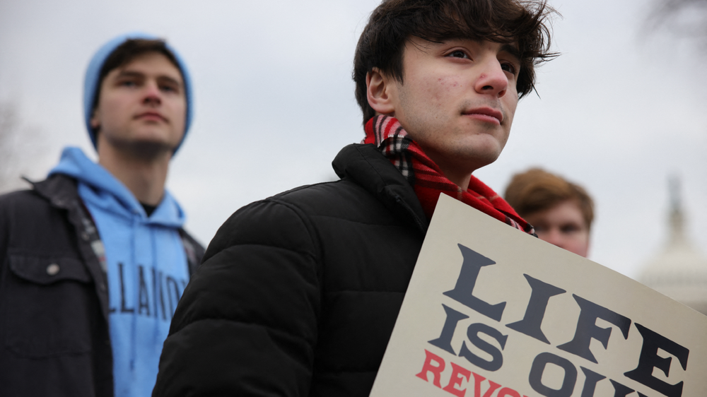 Jóvenes varones cristianos. AFP