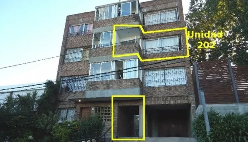 Fachada del edificio donde se encuentra ubicada la propiedad a subastar por Assad