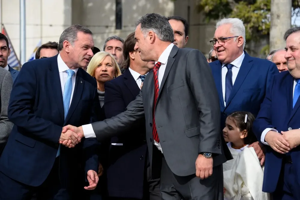 Álvaro Delgado y Yamandú Orsi