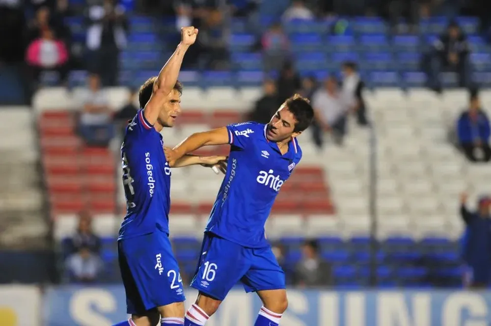 Alonso festeja con De Pena 