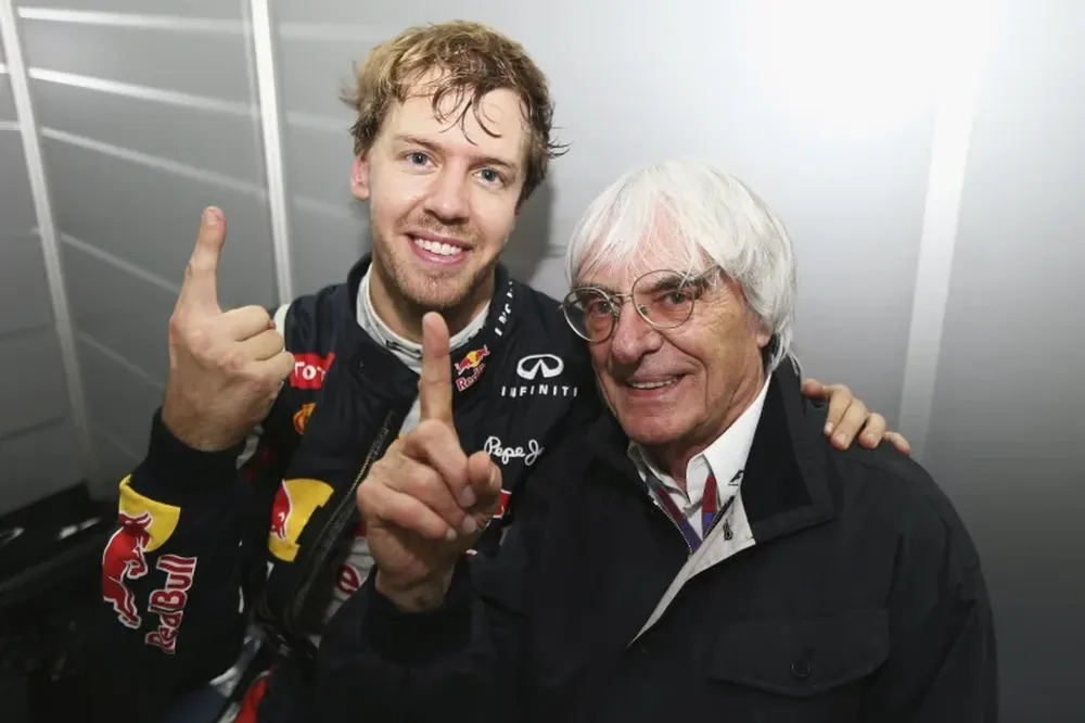 Vettel y Ecclestone: dos número uno. Sin embargo, el equipo del campéon no encabeza el ranking.