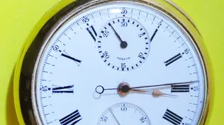 Un reloj de bolsillo de oro de 18 quilates.