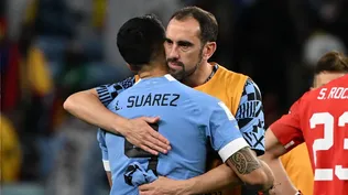 Godín y Suárez durante el Mundial