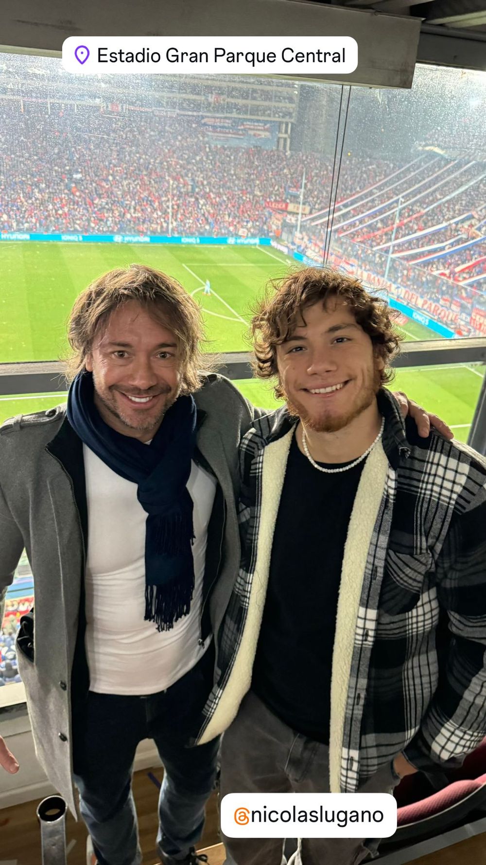 Diego Lugano y Nicolás Lugano viendo a Nacional en el GPC