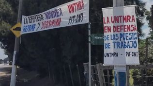 Carteles del Untmra fuera de la planta de Nordex en el barrio Colón&nbsp;