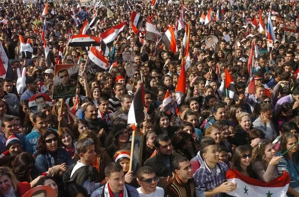Manifestantes sirios en una concentración en Tartous