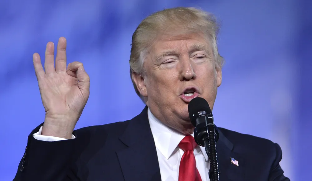 US President Donald Trump addreses the Conservative Political Action Conference (CPAC) at National Harbor, Maryland, on February 24, 2017. / AFP / Mike Theiler