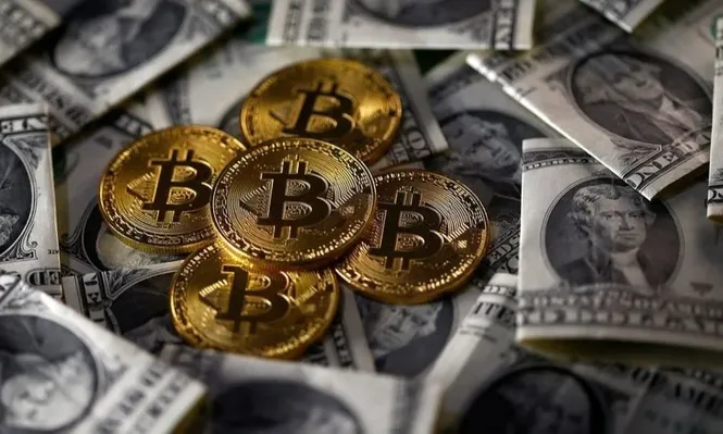 El bitcoin toca los US$ 70.000 y marca su segundo récord en la semana