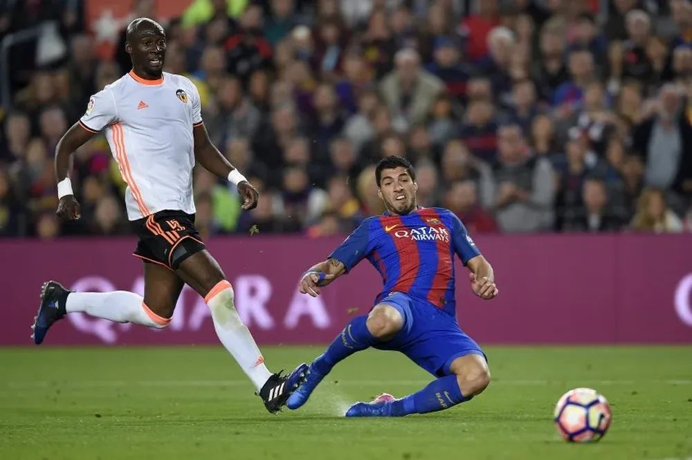 Eliaquim Mangala y Luis Suárez