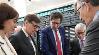 Salvador Illa y Óscar López en la presentacipon del ordenador cuántico en Barcelona