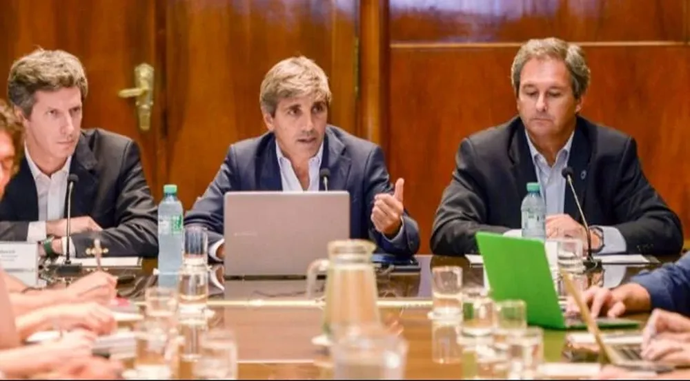 Caputo con Quirno y Bausili, en un paso anterior por la función pública