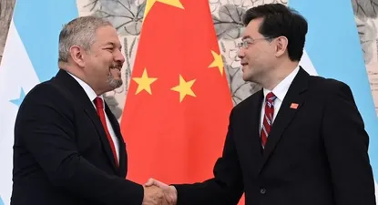 Enrique Reina y Qing Gang