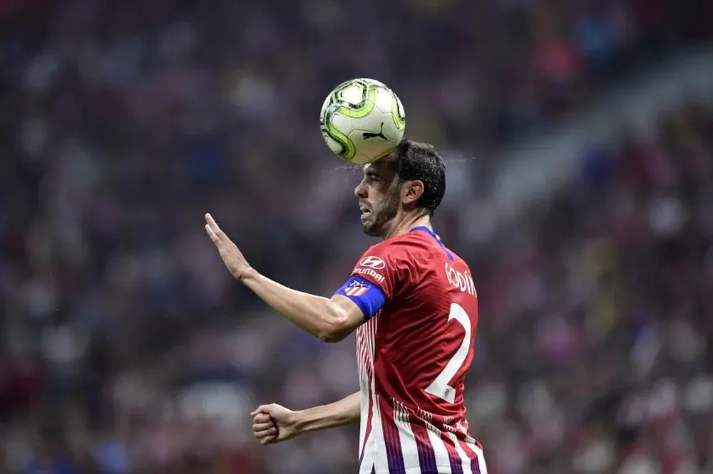 Godín con el brazalete en el último amistoso ante Inter
