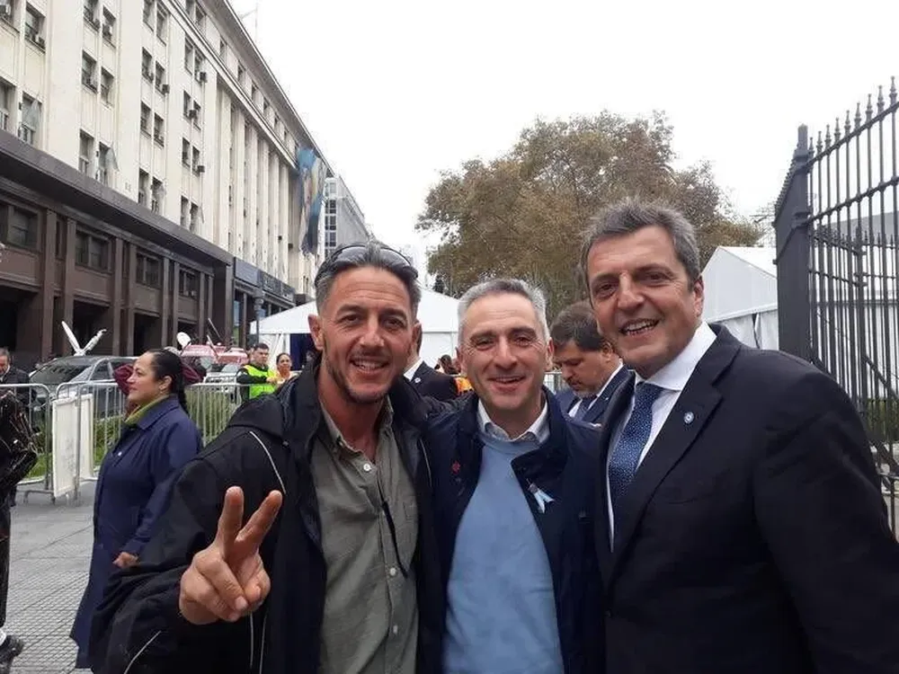 Mercanzini junto a Andrés Larroque y Sergio Massa