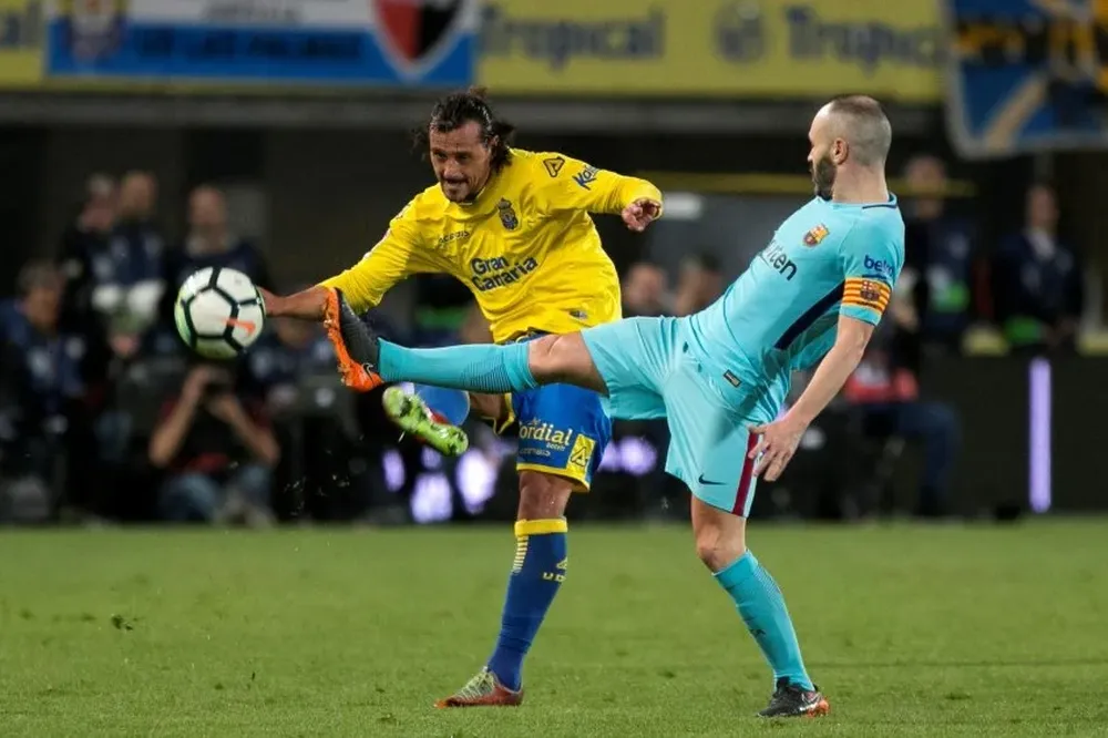 Matías Aguirregaray y Andrés Iniesta