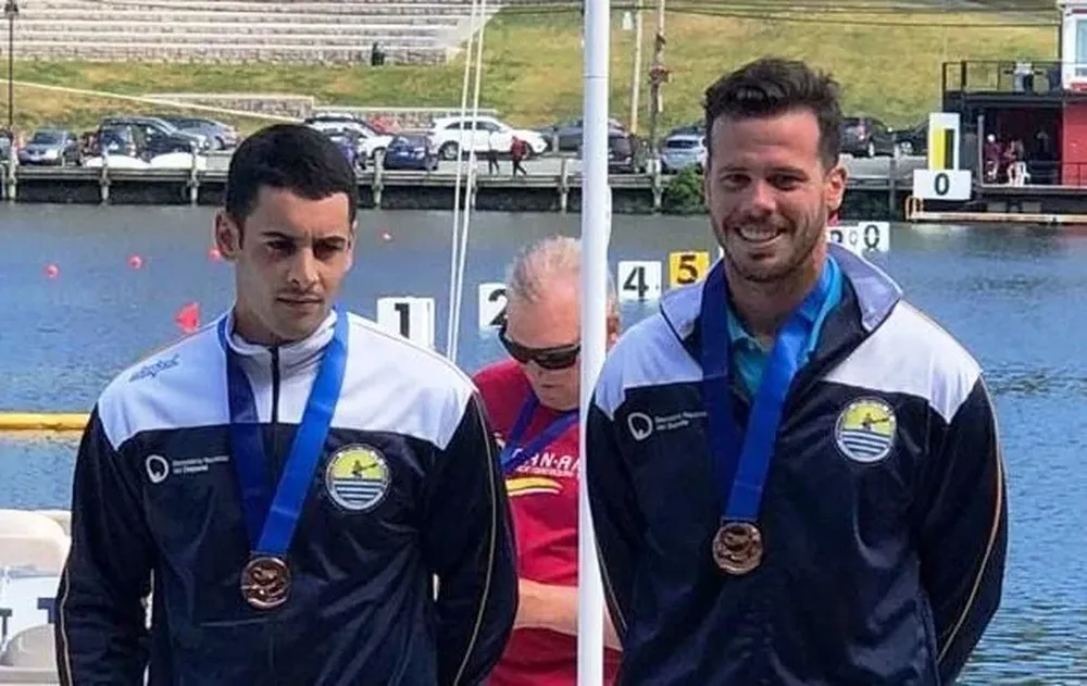 Cabrera y Delgado con la de bronce al cuello