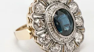 Anillo de 18 quilates con diamantes de dos quilates y zafiro azul