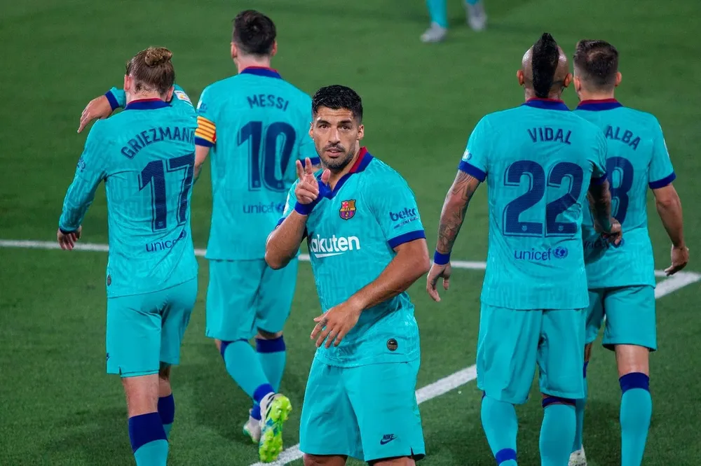 Suárez y Beckham en un encuentro