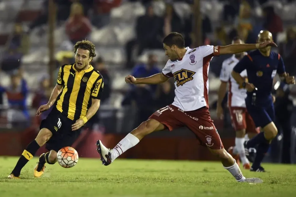 Diego Forlán y Martín Nervo