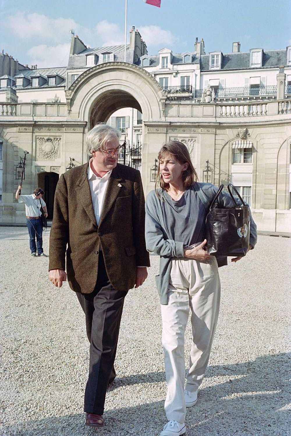 Birkin junto al director de cine Bertrand Tavernier en 1990.