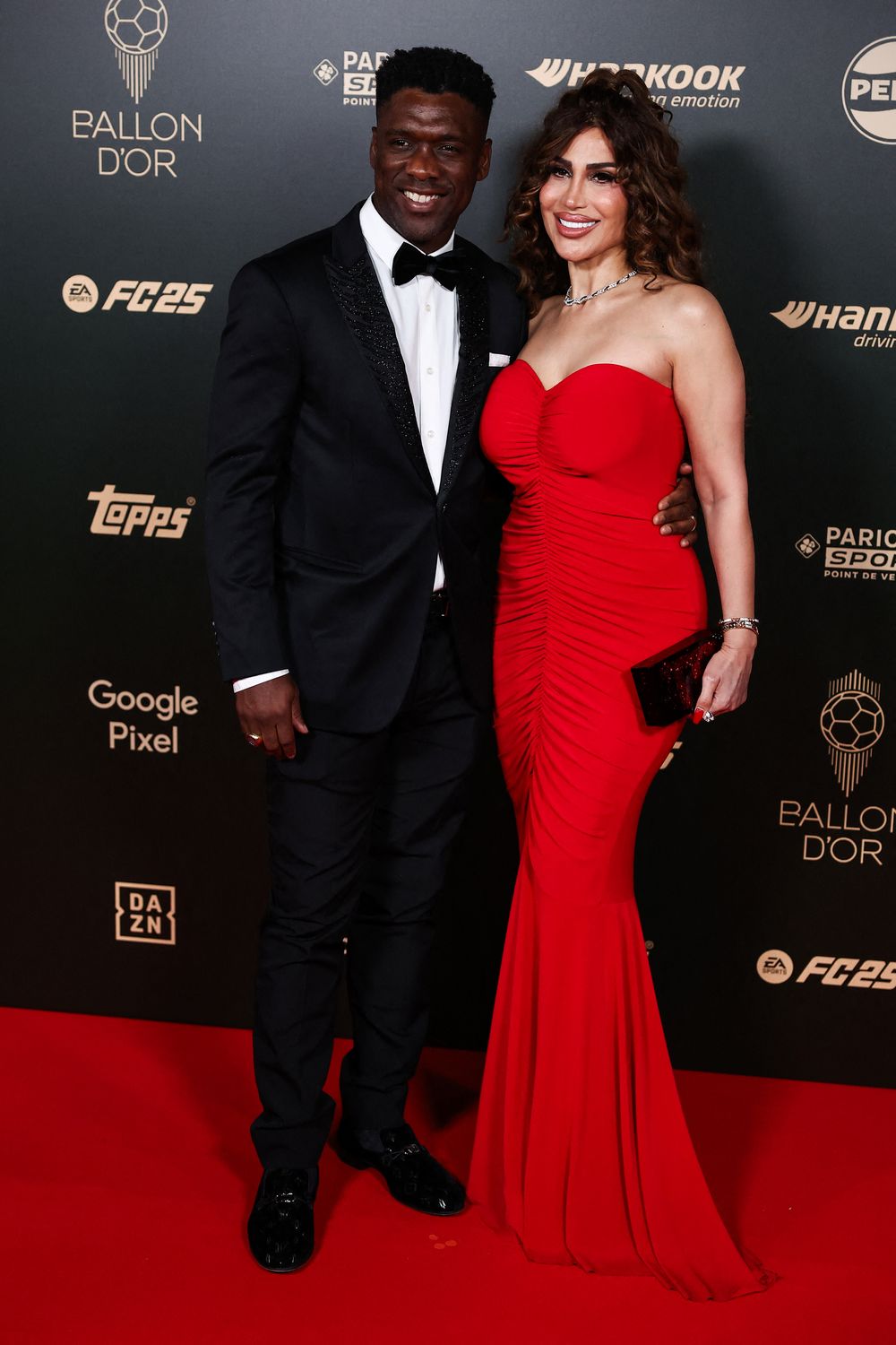 Clarence Seedorf y Sophia Makramati
