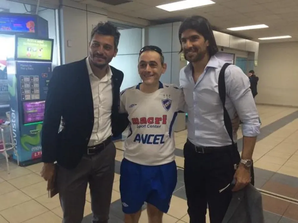 Munúa y Abreu con un hincha tricolor en Panamá