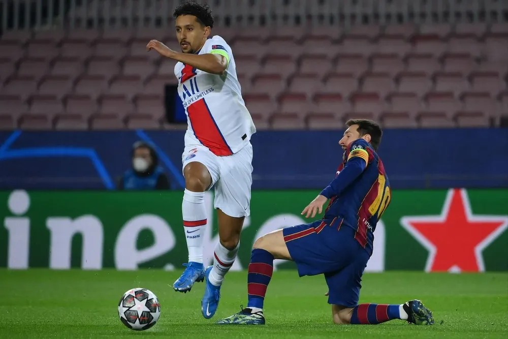 Marquinhos y Leo Messi