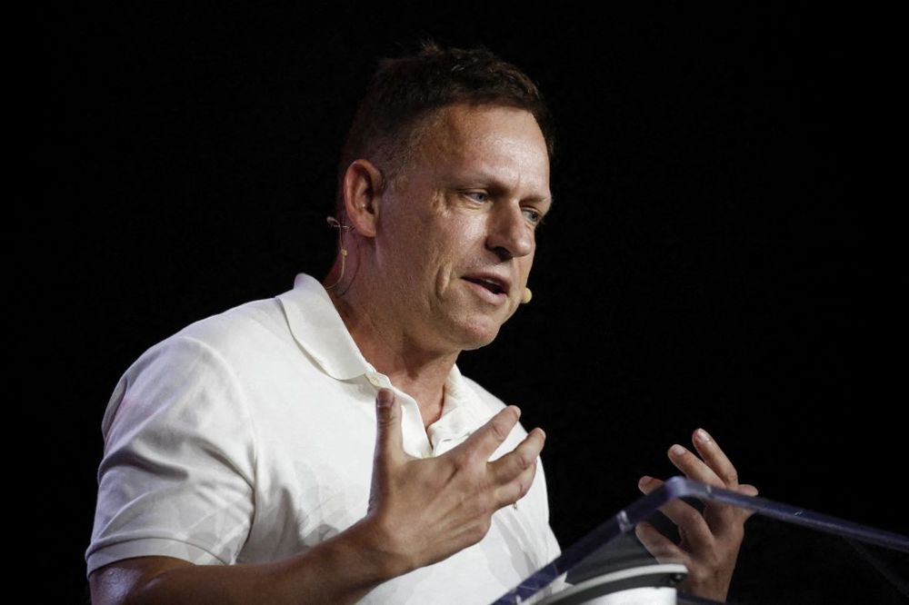 AFP__20220407__1239811420__v1__MidRes__Bitcoin2022ConferenceDrawsCryptocurrencyIndus