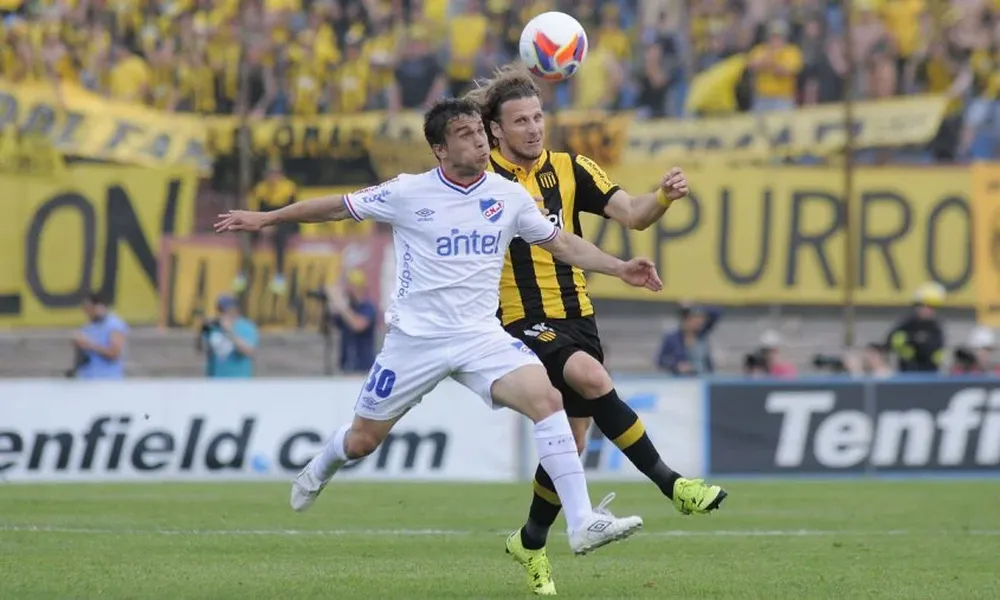 Sebastián Fernández y Diego Forlán