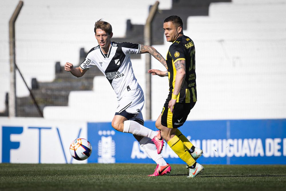 Iván Rossi y Jonathan Rodríguez 