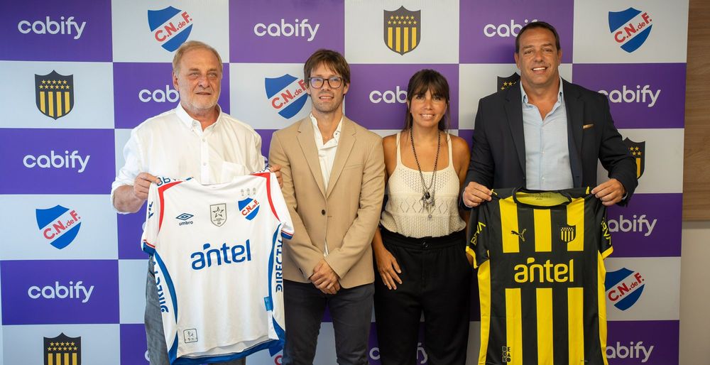 Ricardo Vairo e Ignacio Ruglio en el acuerdo de Nacional y Peñarol con Cabify Uruguay