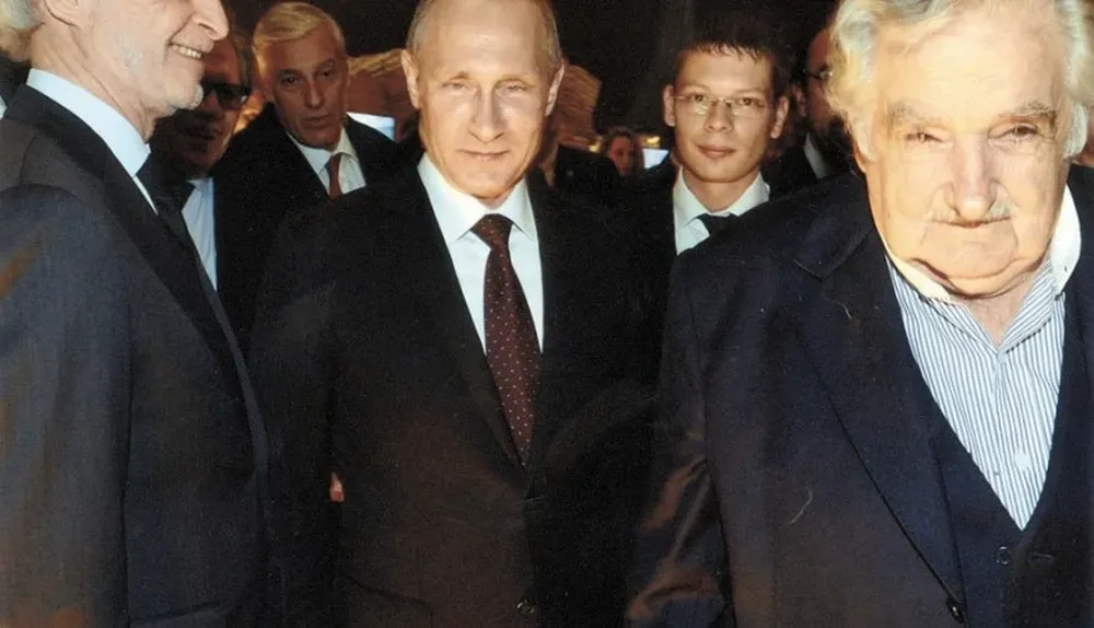 Putin en una cena con el empresario argentino López Mena y el expresidente Mujica