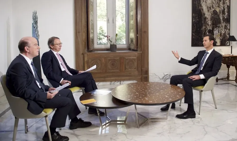 El presidente de Siria, Bachar al Asad, en diálogo José Antonio Vera y José Manuel Sanz, directores de EFE.