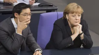 La canciller alemana, Angela Merkel, y el ministro alemán de Economía, Philipp Rösler