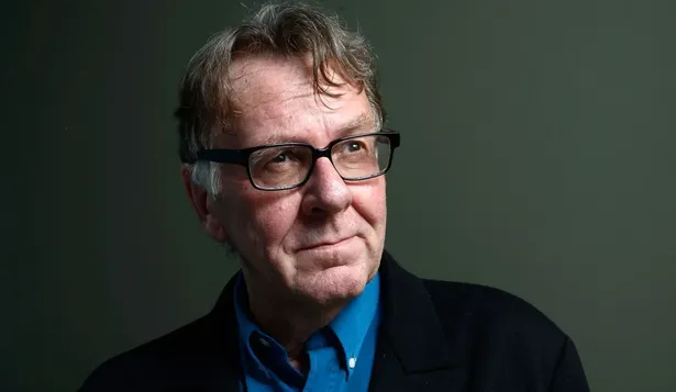 Tom Wilkinson.