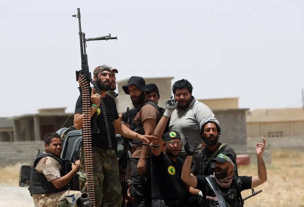 Combatientes de las fuerzas kurdas que enfrentan al Estado Islámico en Irak.