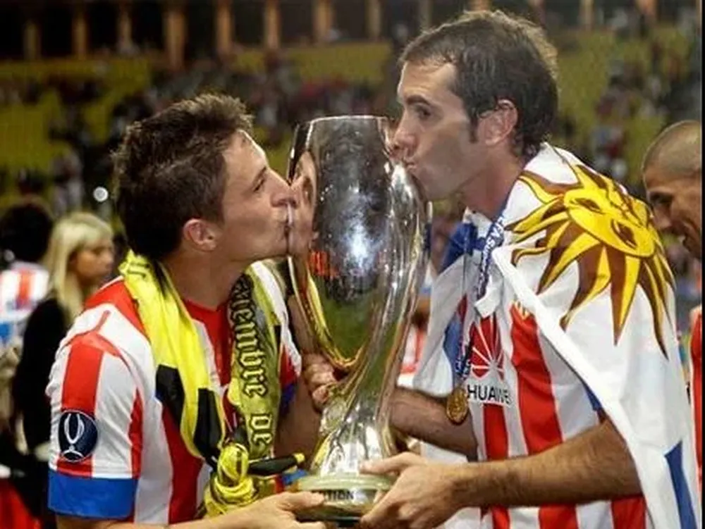 El Cebolla y Godín y uno de los título con Atlético