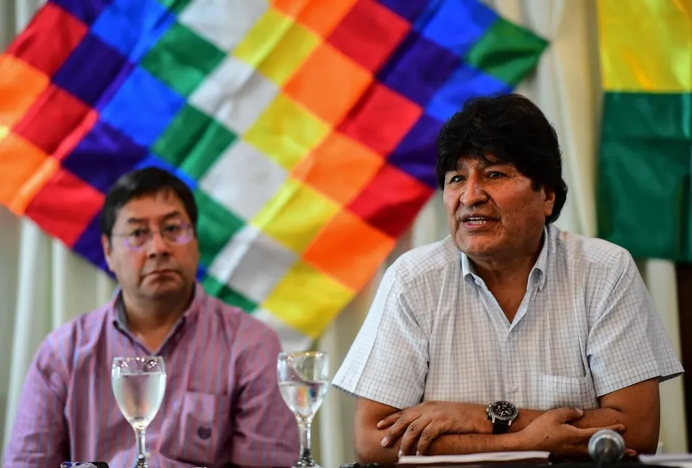 Luis Arce junto a Evo Morales.