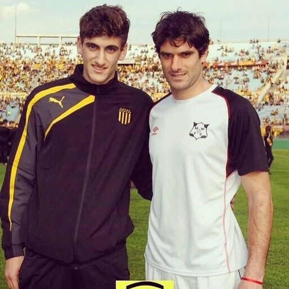 Santiago y Gastón Bueno, antes de un partido entre Peñarol y Racing
