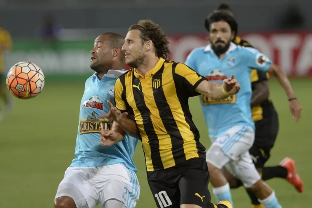 Alberto Rodríguez y Diego Forlán