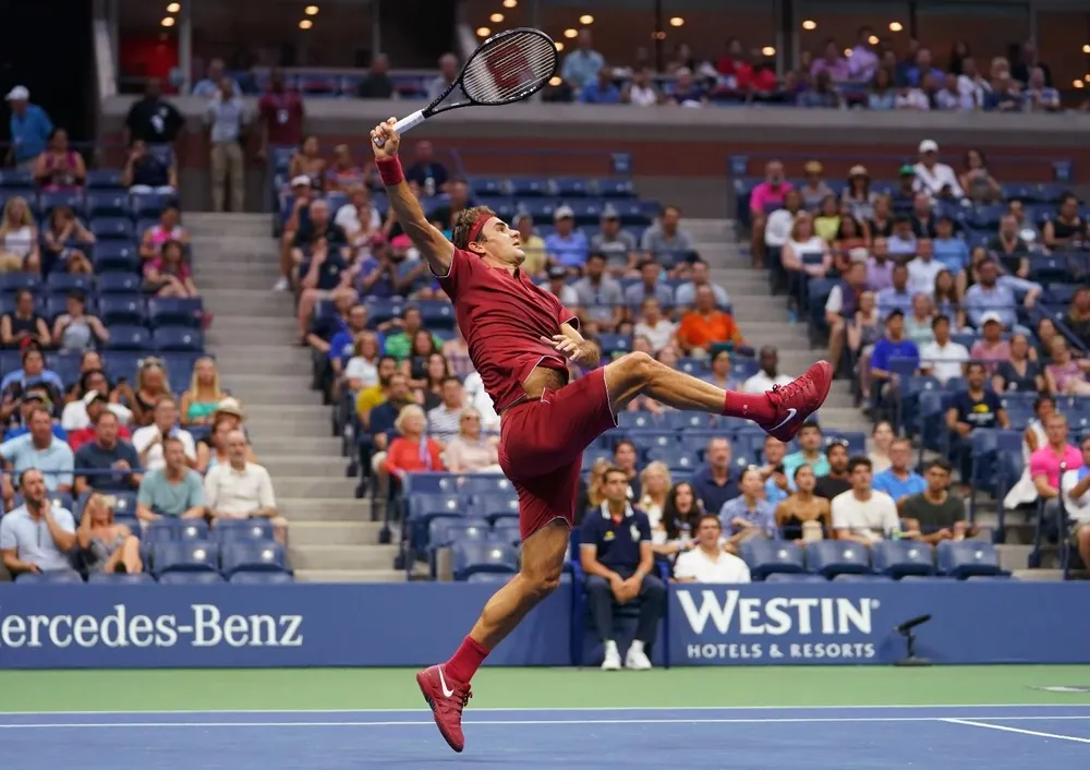 Un poco de magia de Federer en su triunfo ante Nishioka